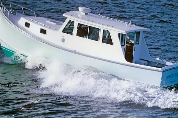 Tuna Tail Charters navigates Gloucester waters in a small custom fishing boat.